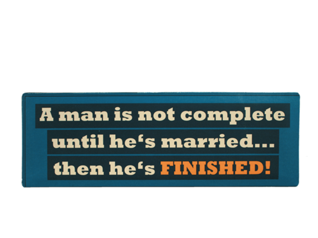 A man is not complete  metal skilt på 15 x 45 cm